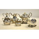 A Victorian oval electroplated four-piece tea service, to/w a nautilus shell spoon-warmer,