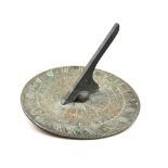 A mid 19th century English bronze horizontal sundial plate, signed W N Last, Bury St Edmunds, the