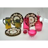 Five Coalport plates decorated with gilt edged reserves painted with pink roses to/w a cranberry