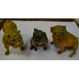 A pair of cold-painted bronze bulldogs, standing and seated, 9 cm high,