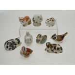 Nine Royal Crown Derby annual members collectors' guild paperweights, gold stoppers,