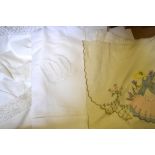 Three boxes containing an assortment of linen to include damask and other table and tray cloths,