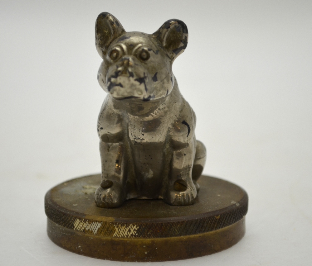 A chromium plated seated bulldog car mascot on radiator cap,