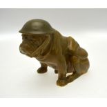 A Royal Doulton model of a bulldog - Old Bill/Tommy, khaki coloured glaze, wearing an army helmet