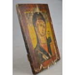 An antique Orthodox Icon (purchased in Russia), painted on a pine panel, depicting Madonna & Child,