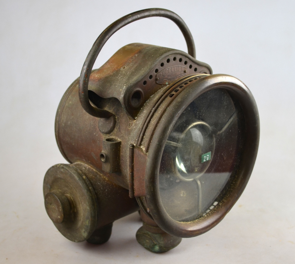 A French Ducellier, Paris, carbide headlamp, the body stamped 1026/4072D, 18 cm diam,