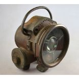 A French Ducellier, Paris, carbide headlamp, the body stamped 1026/4072D, 18 cm diam,