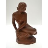 Rudolph Kaesbach 1873-1955 - a plaster maquette of a naked woman on a fabric draped rock, circa