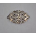 A late Victorian silver pierced and engraved belt buckle,