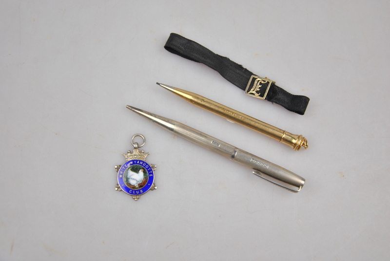 A 9ct gold Eversharp propelling pencil, London 1933, to/w a silver Yard-O-Led example,