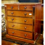 A 19th century miniature satinwood table chest of five long drawers,