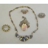 A collection of paste set items comprising pendant,
