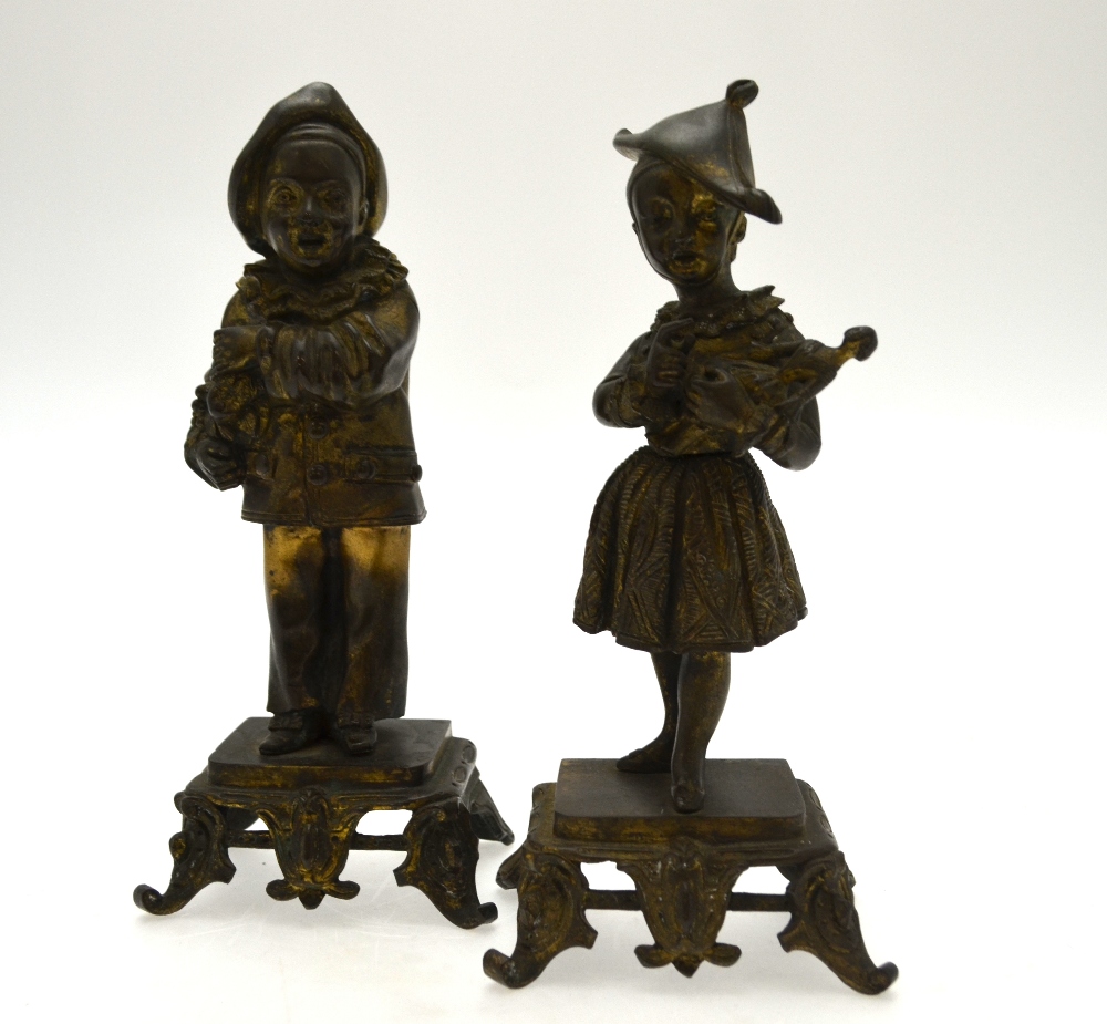 A pair of 19th century Continental bronze garniture figures and a boy clown and girl with doll,