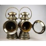 A pair of polished steel bodied Lucas 'King of the Road' car lamps nos 726,