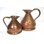 A graduated pair of 19th century ship's one and two gallon measures each having shaped spouts and