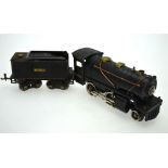 A US Lionel Corporation O-gauge 1-3-0 electric locomotive no 675 with tender,