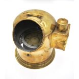 An antique nautical brass binnacle cased gimble framed compass with light box to the side,