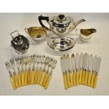 An oval three-piece half-reeded electroplated tea service, to/w a sugar scuttle,