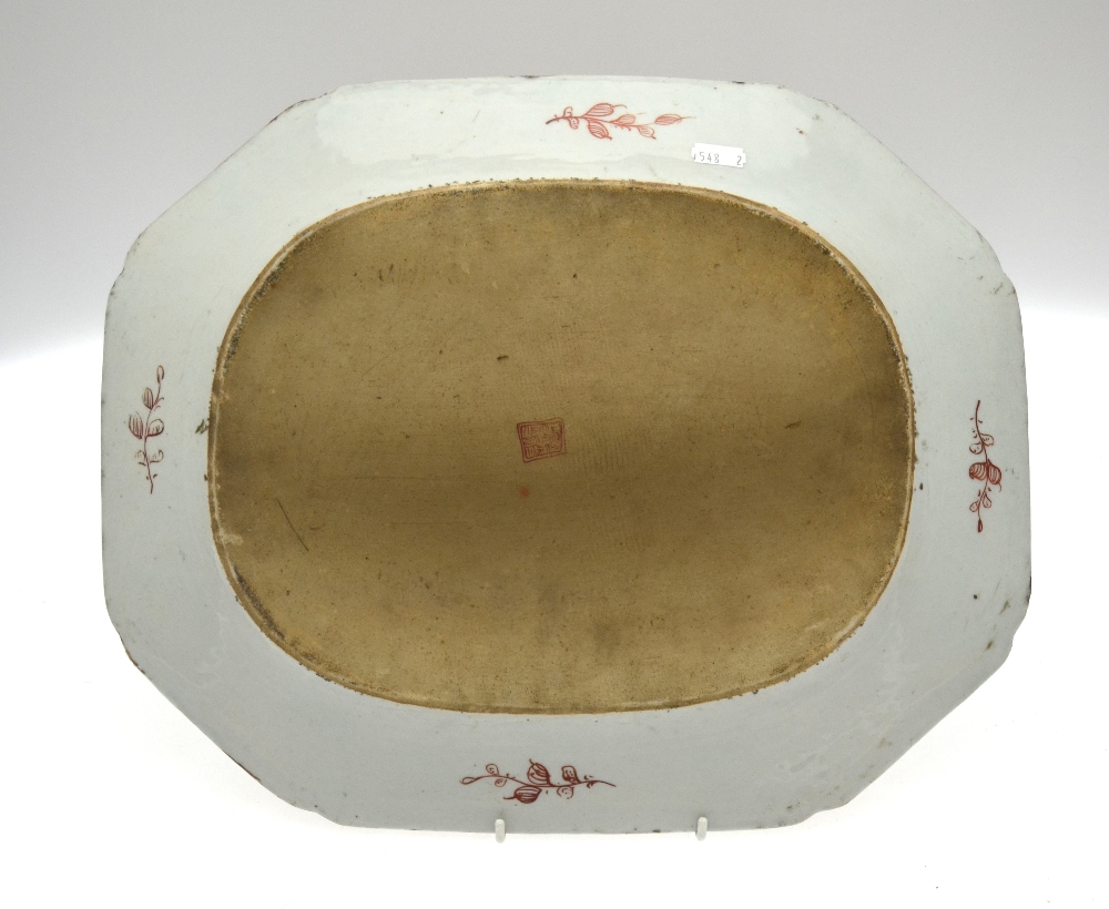 A graduated pair of Chinese 'clobbered' chamfered rectangular meat plates decorated with plants - Image 2 of 3