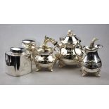 Two electroplated tea canisters engraved for Fortnum & Mason, to/w a three-piece tea service,