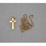 A 9ct yellow gold rope style chain c/w yellow metal cross stamped 15ct, with inset diamond,