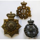 A trio of Victorian regimental helmet plates - a brass 67th Regiment of Foot (South Hampshire);
