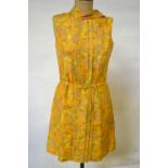Three 1960's dresses - a Peter Barron orange/green/yellow dress with white collar (size 14), a
