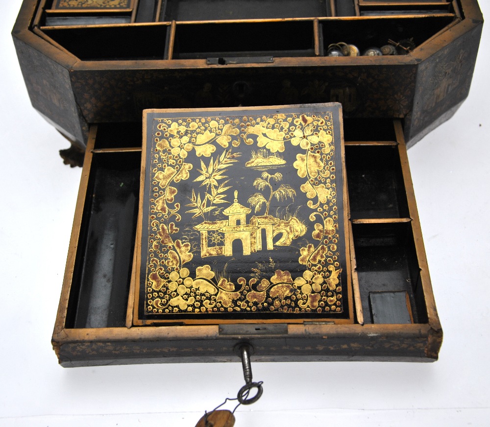 A Chinese 19th century black lacquer octagonal workbox, the hinged cover decorated in gilt with - Image 3 of 4