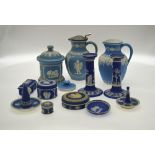 A collection of blue jasperware, the dark blue colour all Wedgwood, comprising milk jug, hot water