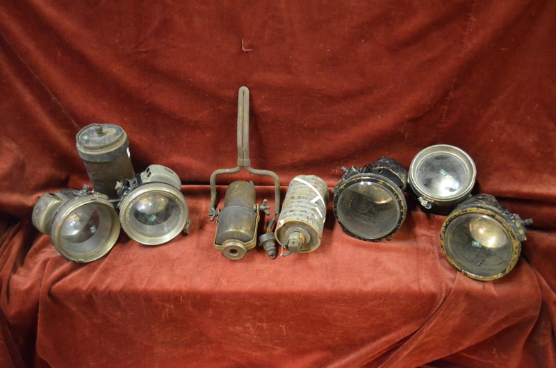 Assorted vintage carbide car lamps including a pair of japanned Powell & Hanmer Ltd,