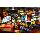 An extensive collection of Dinky, Corgi and other model vehicles in played-with condition,