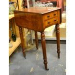 A Victorian mahogany drop side occasional table having two drawers to one end opposing dummy drawer