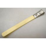 A late Victorian page-turner with ivory blade and foliate-embossed silver handle, William War,
