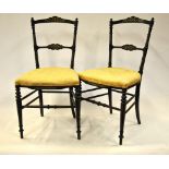 A pair of Victorian ivorine inlaid stained beech framed salon side chairs (2)
