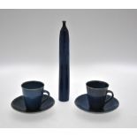 Rupet Spira (British b. 1960) - a pair of blue glazed coffee cans and saucers to/w a Tessa Fuchs (