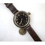 A WW1 silver wristwatch, the black dial with subsidiary seconds dial and luminous hands and