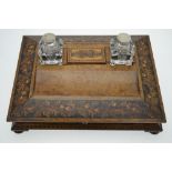 A Tunbridge ware desk stand, the glass ink-bottles with Chinese coin stoppers,
