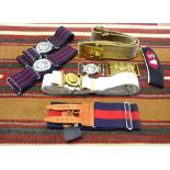 Assorted military webbed belts and buckles including; Royal Army Ordnance Corps (2); Dragoons;