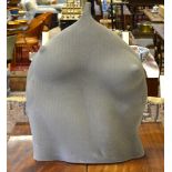 D Cohen - A ceramic freeform sculpture of a torso have a rough grey textured surface,