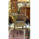 A late 19th century stickback walnut/fruitwood armchair