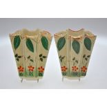 A pair of Arthur Wood Art Deco wall pockets decorated with flowers and foliage, approx. 23 cm