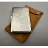 A heavy quality engine-turned silver cigarette case, DRH, Birmingham 1945, 7 oz Condition Report