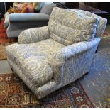 A pair of Howard style easy armchairs upholstered in Jane Churchill paisley design fabric (2)