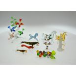 A collection of Murano glass comprising three tigers, three horses, two trees with birds,