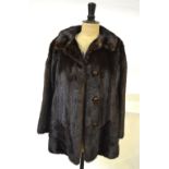 A dark brown mink fur jacket with revere retailed by The National Fur Company, 52 cm across chest