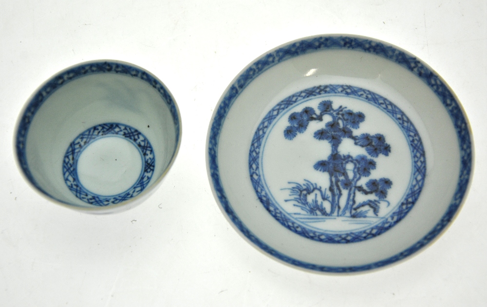 A Chinese blue and white Nanking Cargo teabowl and saucer decorated with a watery landscape to/w a - Image 2 of 4