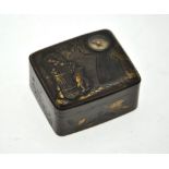 A Japanese rectangular box and hinged cover decorated in gilt with a figure carrying a large sheath