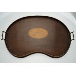 A 19th century kidney-shaped brass handled tray centred by an inlaid satinwood batwing motif