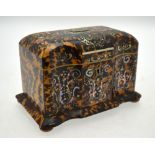 A Victorian tortoiseshell tea caddy of serpentine-front form,