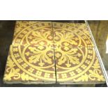 A set of four 19th century Minton terracotta floor tiles with Gothic style slip design (by repute,